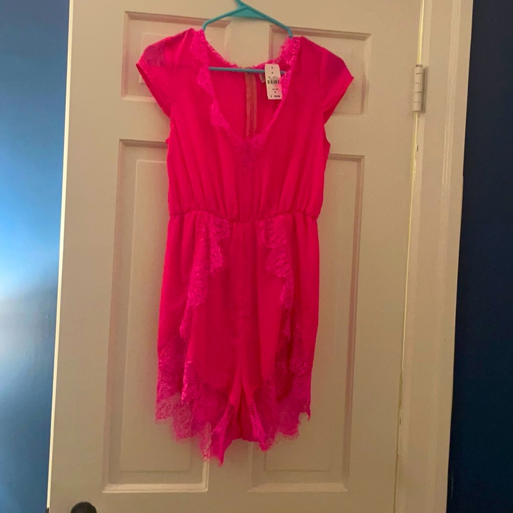 Never before worn neon pink lace romper